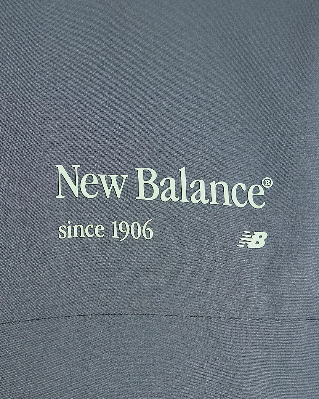 Veste à capuche New Balance Reimagined Woven - Gris