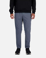 Pantalon New Balance AC Tapered - Gris