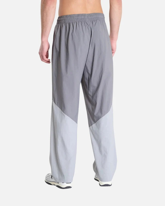 Pantalon New Balance Sport Legacy - Gris